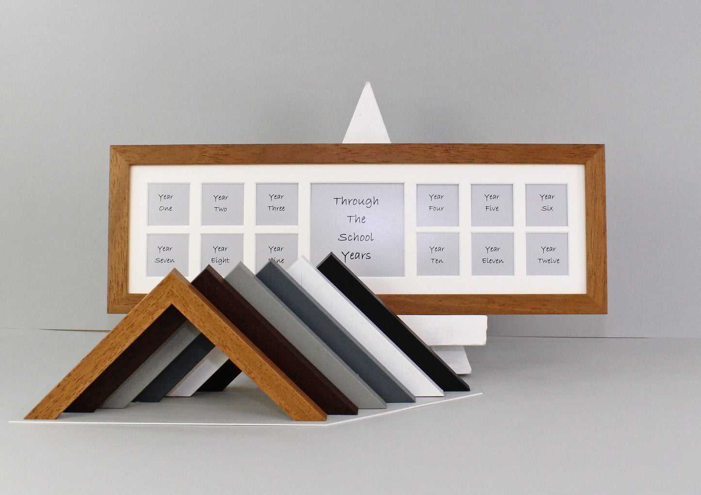 Through School Years Photo Frame - Multi Aperture Frame. 15x50cm. Small wooden multi aperture photo frame to display 12 2x2inch pictures of your child's school years. - PhotoFramesandMore - Wooden Picture Frames
