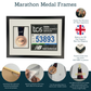 The image is an advertisement for "Marathon Medal Frames" from TATA CONSULTANT SERVICES. It features a framed medal with a runner's number, a medal with a runner's number, and a medal with a runner's number. The frames are made from real wood and not fake or plastic. The ad provides instructions on how to mount and remove the backboard, as well as how to secure the medal in place using tape.