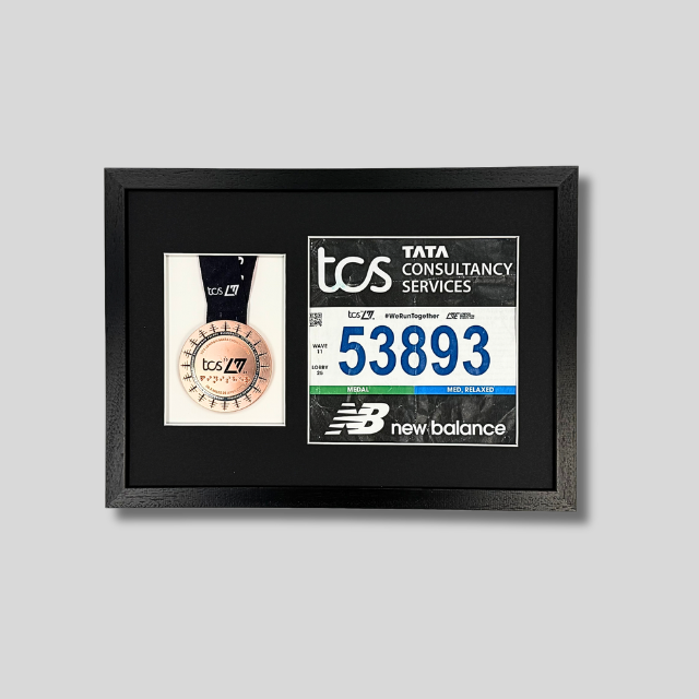 London Marathon 2026 - Medal and race number display.