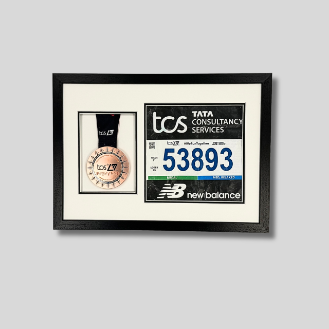 London Marathon 2026 - Medal and race number display.