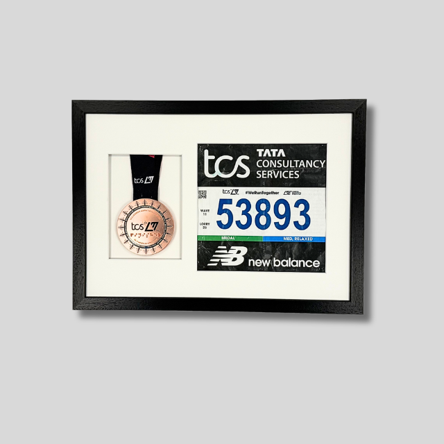 London Marathon 2026 - Medal and race number display.