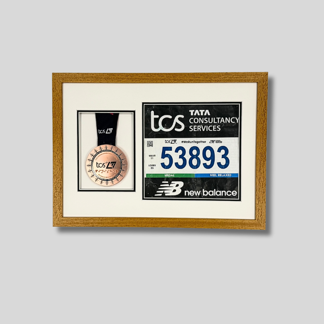London Marathon 2026 - Medal and race number display.