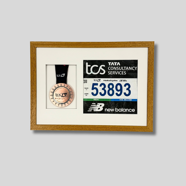 London Marathon 2026 - Medal and race number display.