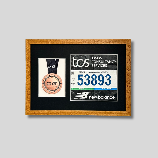 London Marathon 2026 - Medal and race number display.
