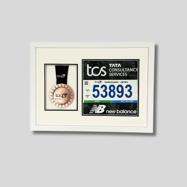 London Marathon 2026 - Medal and race number display.
