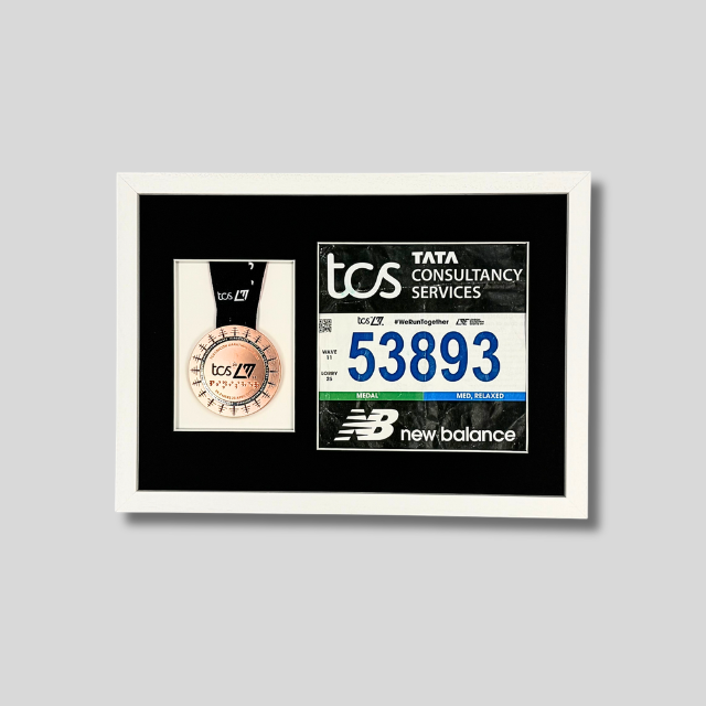 London Marathon 2026 - Medal and race number display.