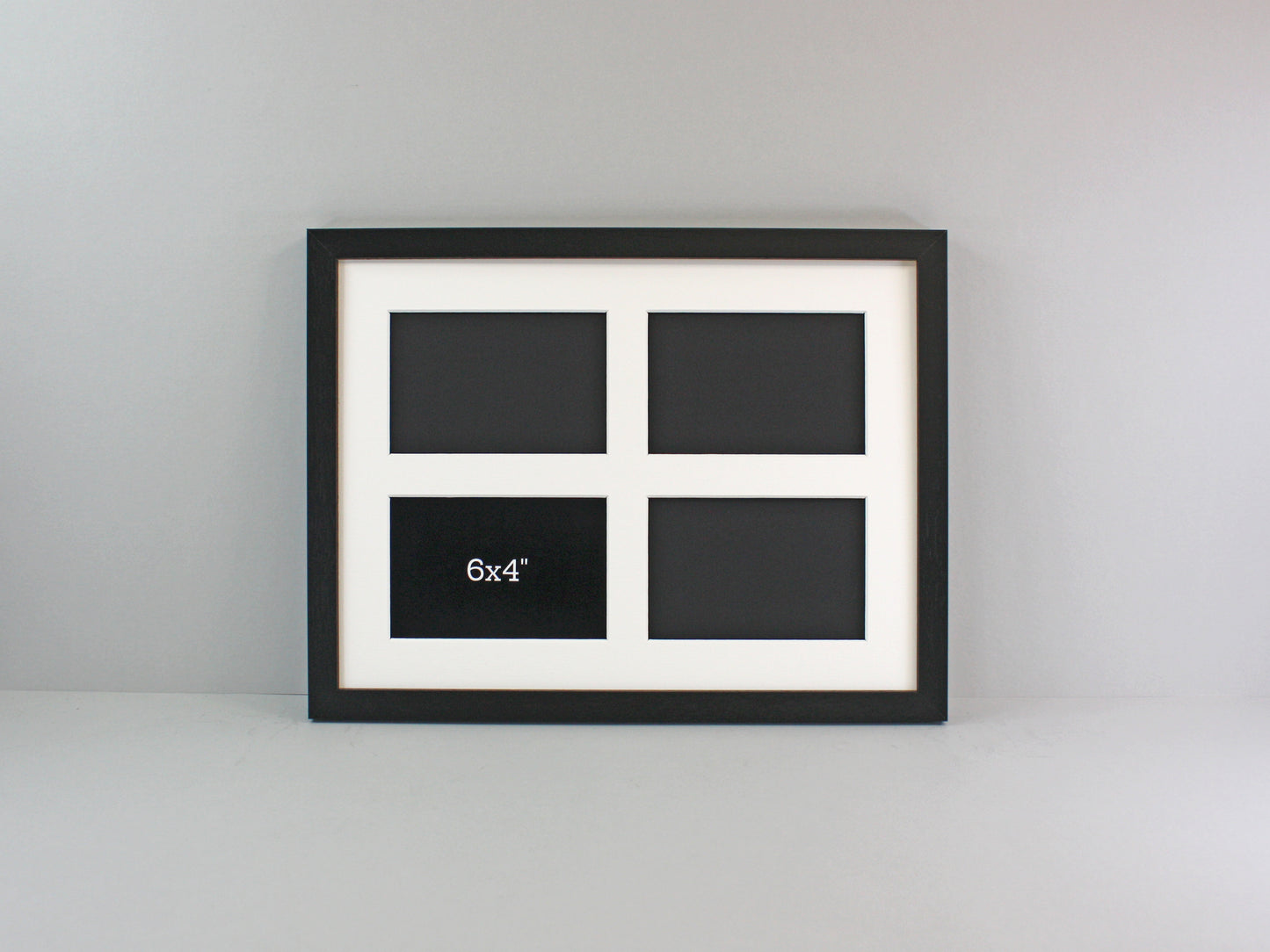 Suits Four 6x4" photos. 30x40cm. Multi Aperture Photo Frame.