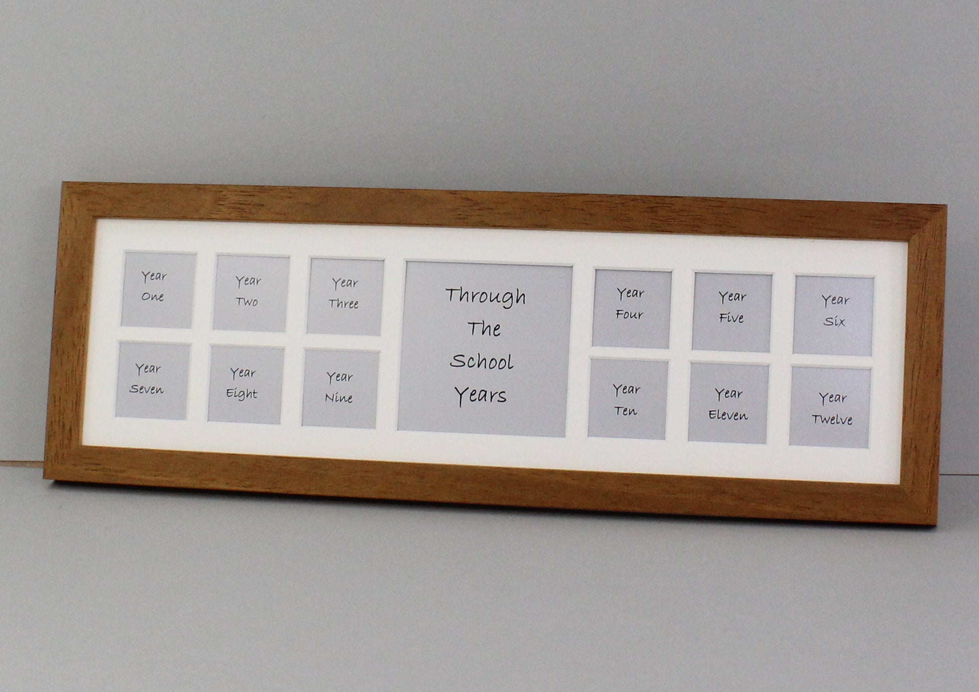 Through School Years Photo Frame - Multi Aperture Frame. 15x50cm. Small wooden multi aperture photo frame to display 12 2x2inch pictures of your child's school years. - PhotoFramesandMore - Wooden Picture Frames