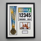 a framed collage of a medal, a photo, and text related to the Worcestershire Marathon.