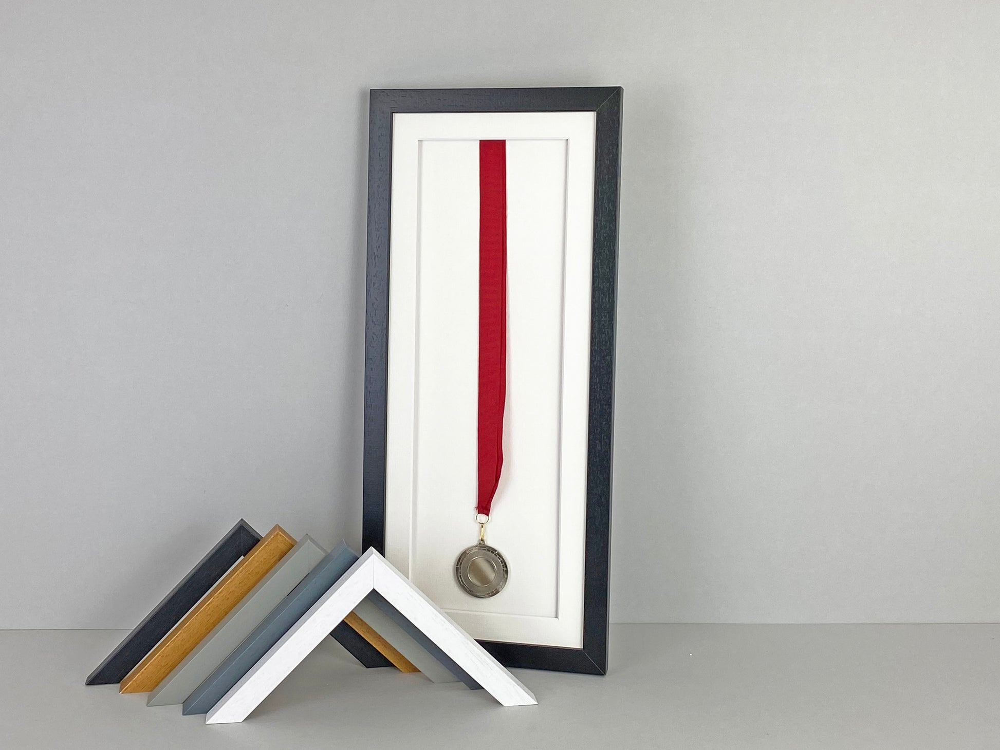 Medal display Frame. For one medal, with full ribbon on show. 20x50cm. - PhotoFramesandMore - Wooden Picture Frames